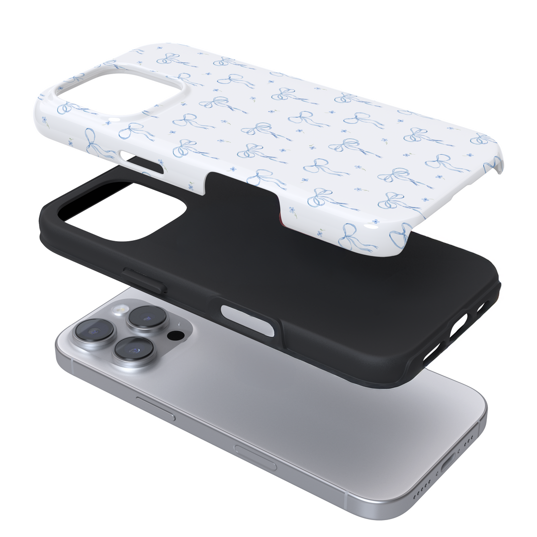 Expanded view of a phone case with a blue bow pattern on a white background
