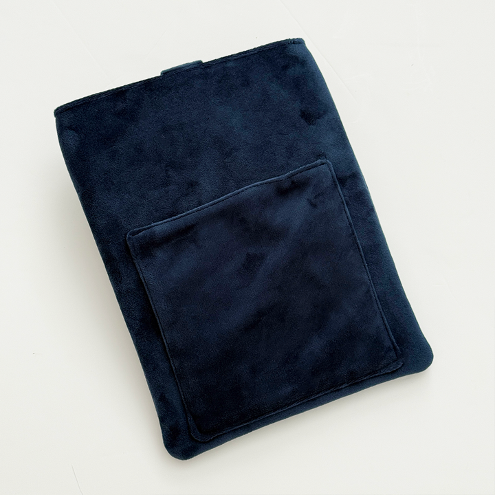 Reverse of Book Sleeve made from soft navy blue velvet showing back pocket, photographed on a white background.