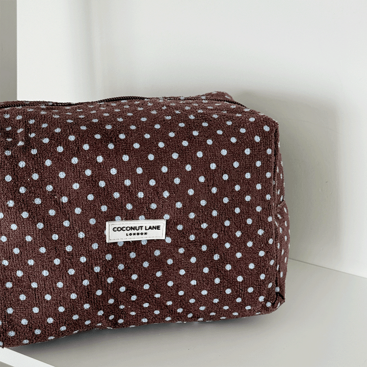 Brown towel texture Makeup Bag with blue polka dot design. 