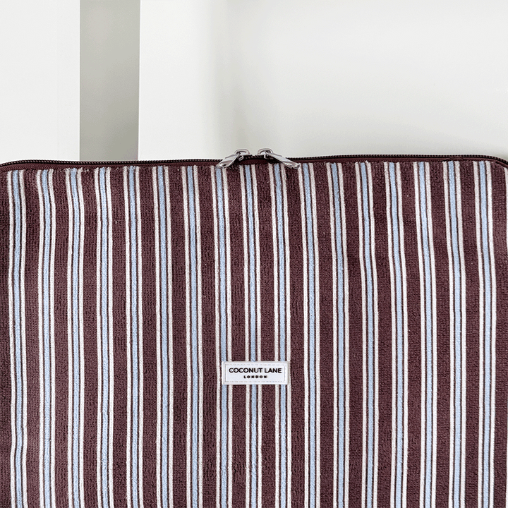 Brown, white and blue striped Laptop Sleeve with silver zip and Coconut Lane logo badge.