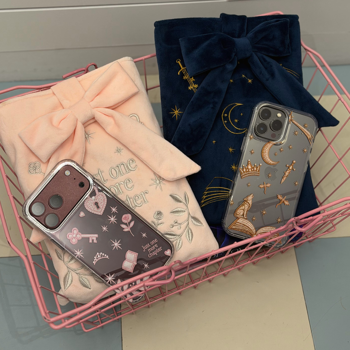 Love and lore collection featuring Fantasy girl clear case and book sleeve, alongside the Romance girl clear phone case and book sleeve. 

