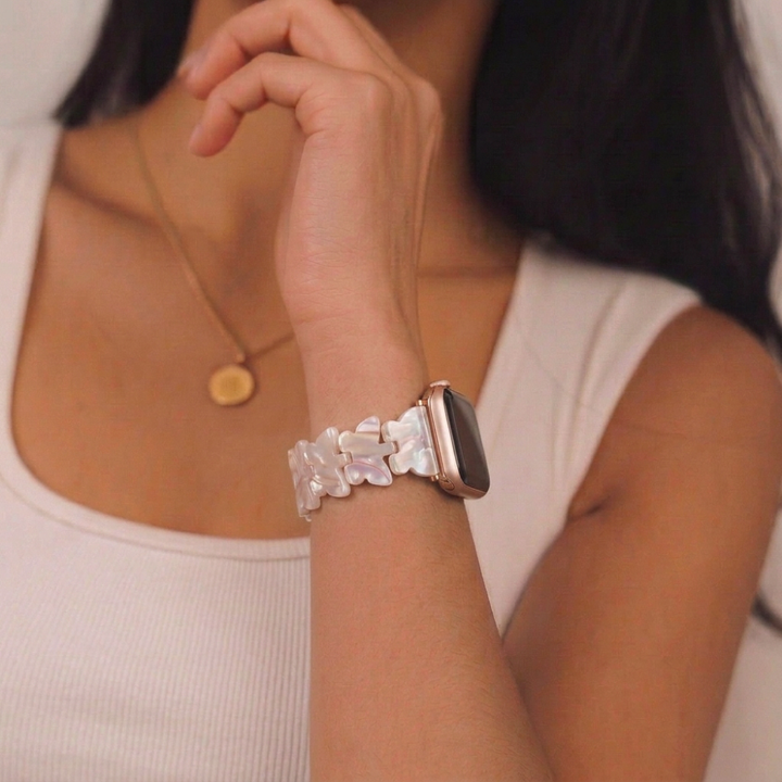 Girl wearing the Luxe Holo Butterfly Watch Strap