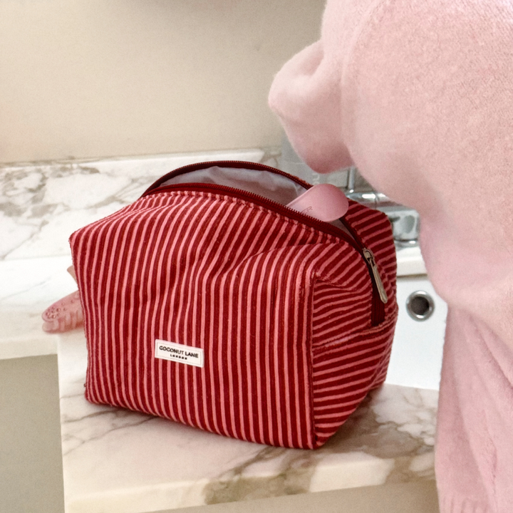 Makeup Bag on the side of the bathroom sink