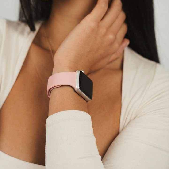 Coral Pink NAKD Apple Watch Strap close up picture on a wrist