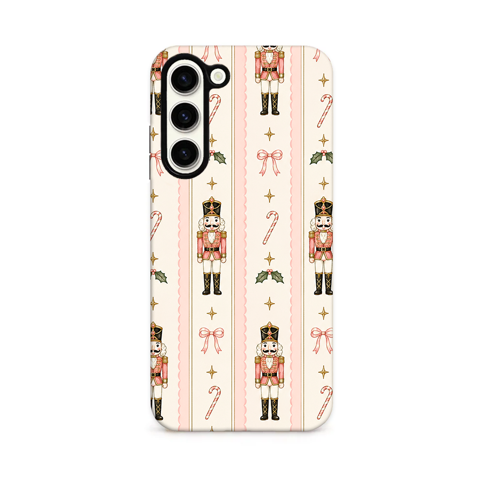 Cute nutcracker, candy cane, bows and sparkles case with pink stripes.