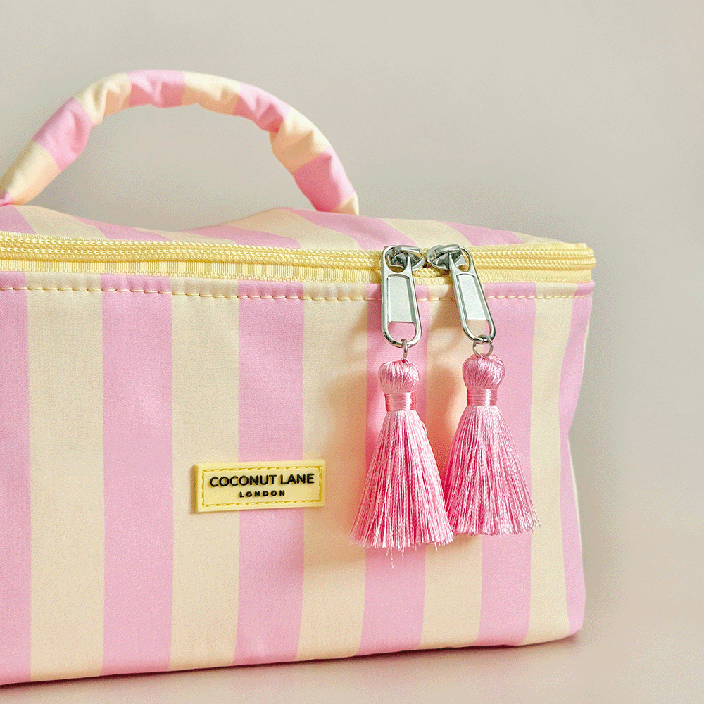 Yellow and pink stripe Vanity Case, with tassels and padded handle.