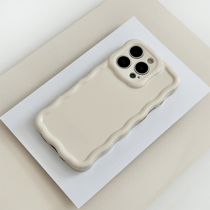 Plain creamy white coloured Phone Case with wavy edge effect.