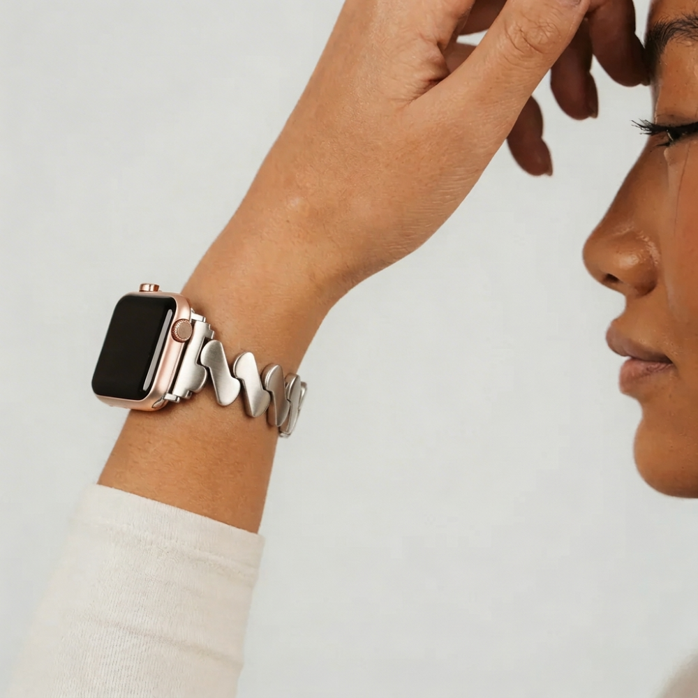 girl wearing get wavy starlight watch strap in studio shoot wearing long sleeve white t-shirt