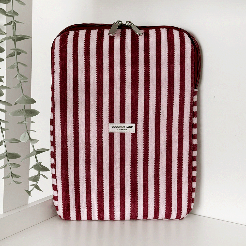 Burgundy and light pink striped iPad Sleeve, with silver zip and Coconut Lane logo badge.